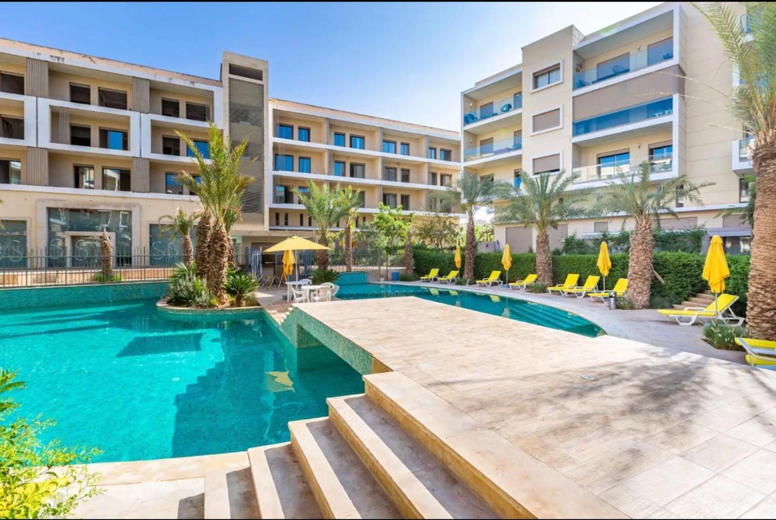 Appartement Luxueux Avec Piscine 10 Minutes Du Centre Ville マラケシュ エクステリア 写真