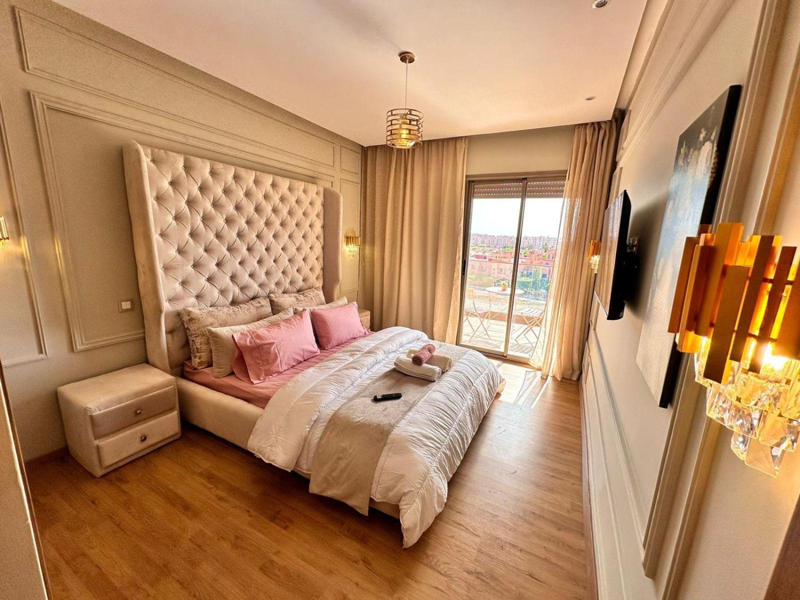 Appartement Luxueux Avec Piscine 10 Minutes Du Centre Ville マラケシュ エクステリア 写真